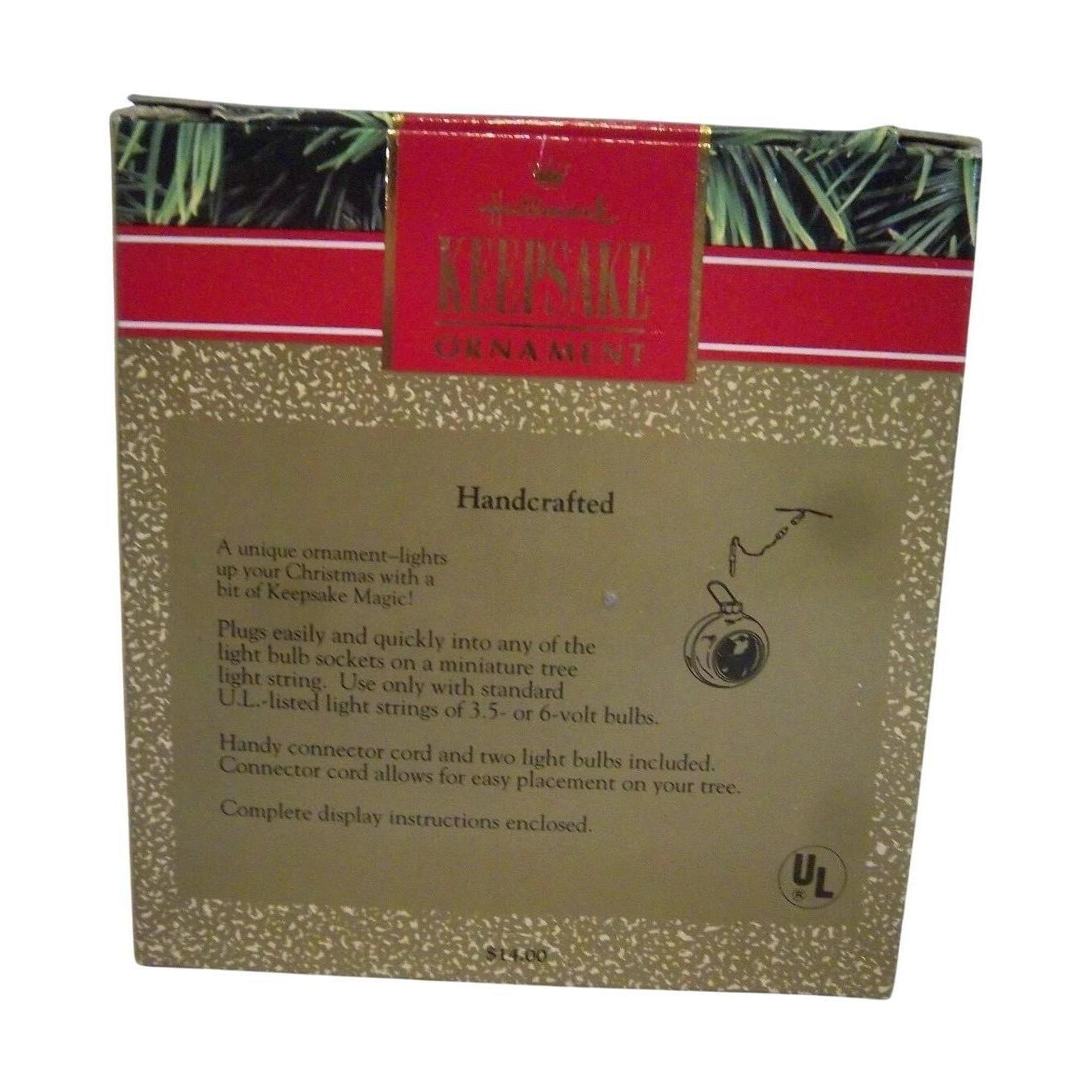 1991 Holiday Glow Hallmark Ornament (Puppy) QLX7177