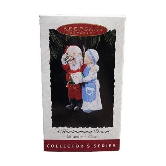1994 A Handwarming Present Hallmark Ornament (Mr. and Mrs. Claus) QX5283