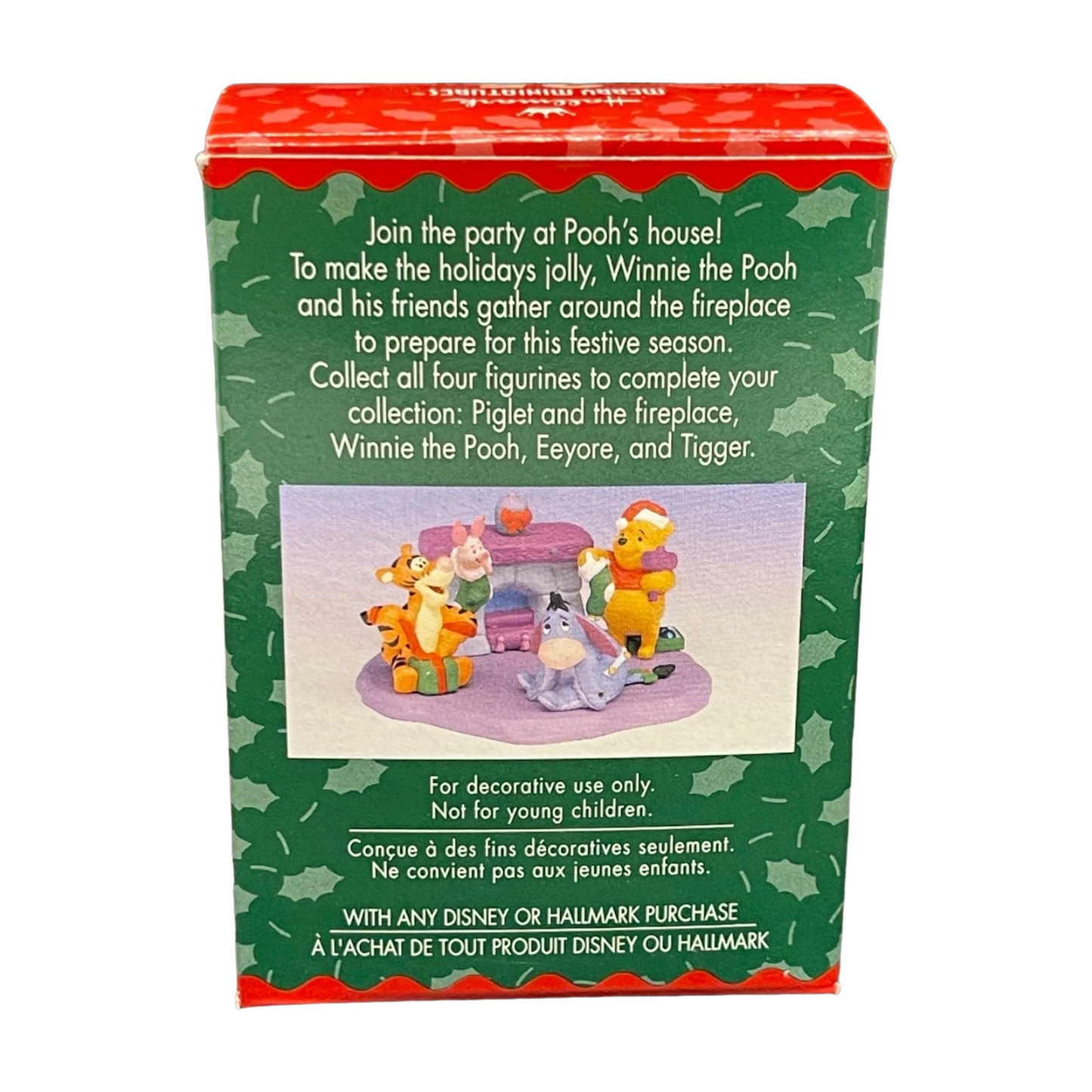 Box for Winnie the Pooh figurines with festive design and text.