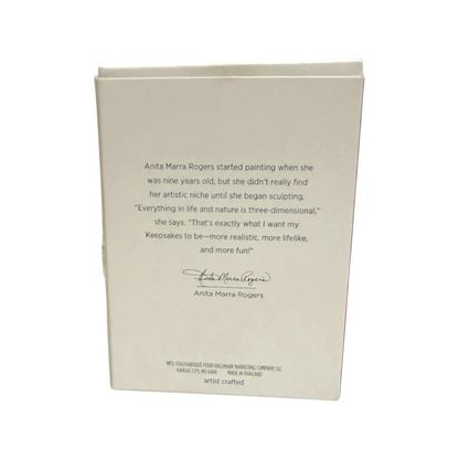Book with text and signature on a white background