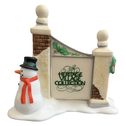 1989 Village Sign with Snowman (Heritage Village Series – Department 56, Item #1341354)