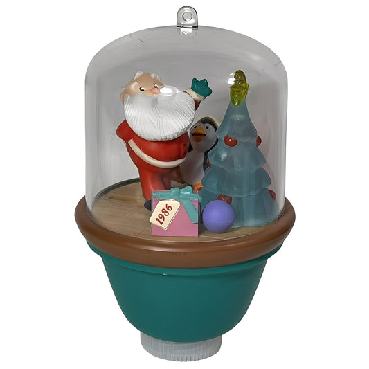 1986 Lighting the Tree Hallmark Ornament (Santa and Sparky) QLX7033