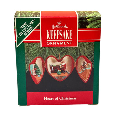 1990 Santa Filling the Stockings Hallmark Ornament (Heart of Christmas) QX4726