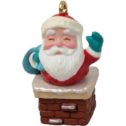 1990 Perfect Fit Hallmark Ornament (Santa Claus) QXM5516
