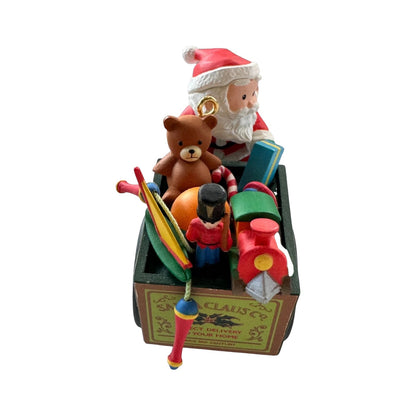 1991 Peddle Pushin' Santa - Third Issue in the "Travelin' Santa" Series (Santa Claus)