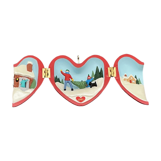 1991 Bringing Home the Tree Hallmark Ornament (Heart of Christmas) QX4357 Image1