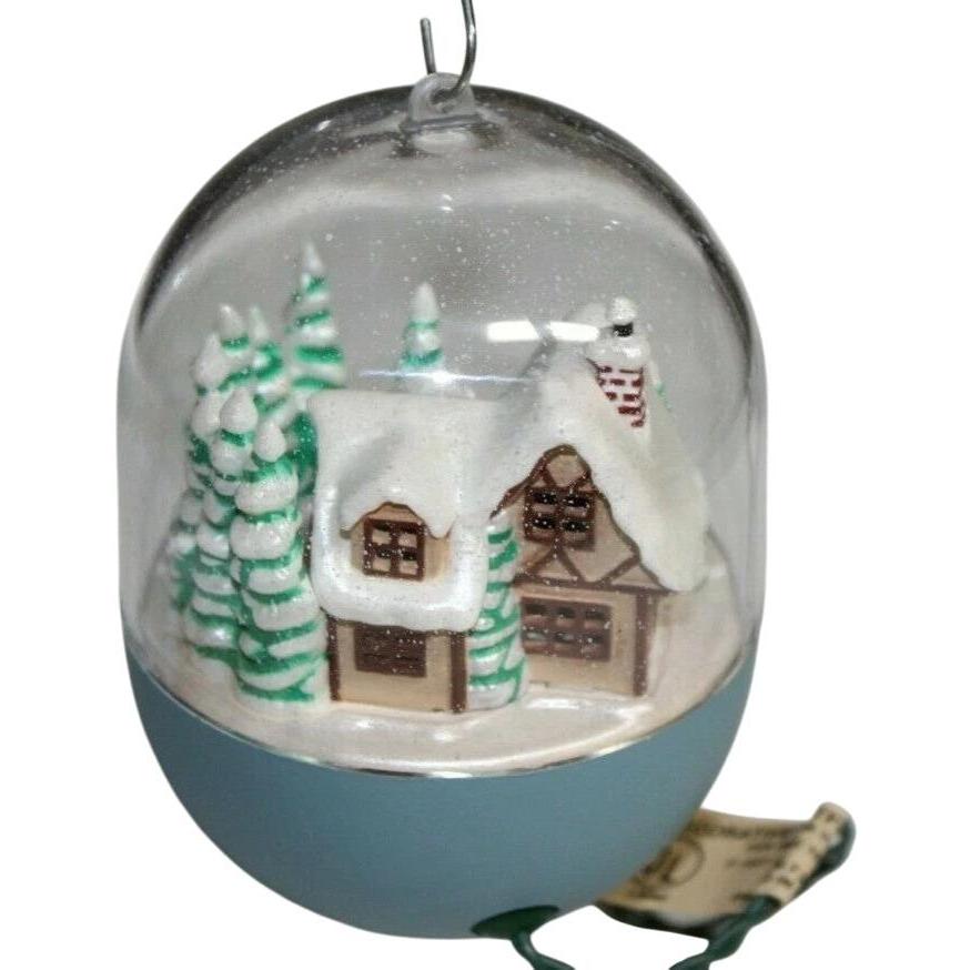 1991 Bringing Home the Tree Hallmark Ornament (Light & Motion) QLX7249