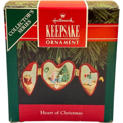 1992 Decorating the Tree Hallmark Ornament (Heart of Christmas) QX4411