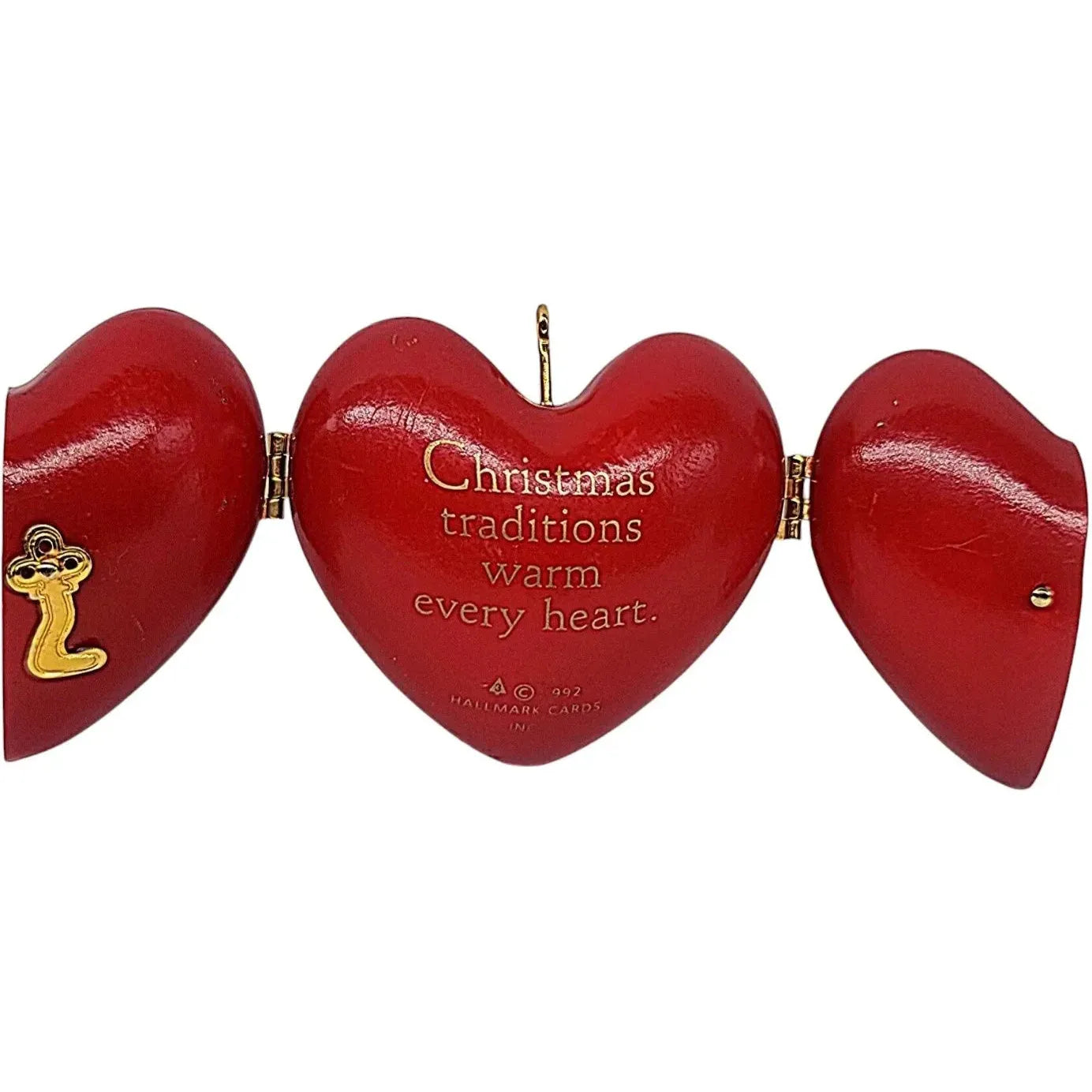 1992 Decorating the Tree Hallmark Ornament (Heart of Christmas) QX4411