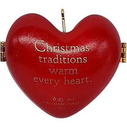 1992 Decorating the Tree Hallmark Ornament (Heart of Christmas) QX4411