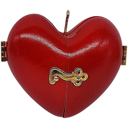 1992 Decorating the Tree Hallmark Ornament (Heart of Christmas) QX4411