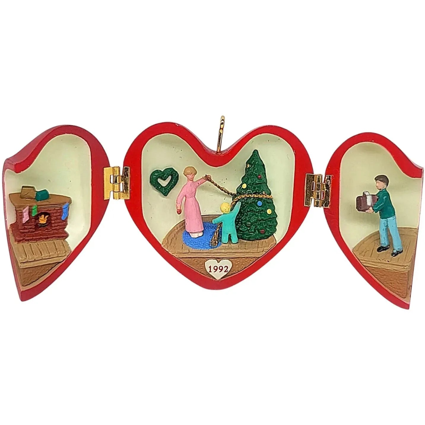 1992 Decorating the Tree Hallmark Ornament (Heart of Christmas) QX4411