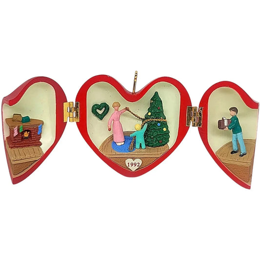 1992 Decorating the Tree Hallmark Ornament (Heart of Christmas) QX4411