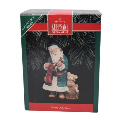 1992 Filling the Stocking Hallmark Ornament (Merry Olde Santa) QX4414
