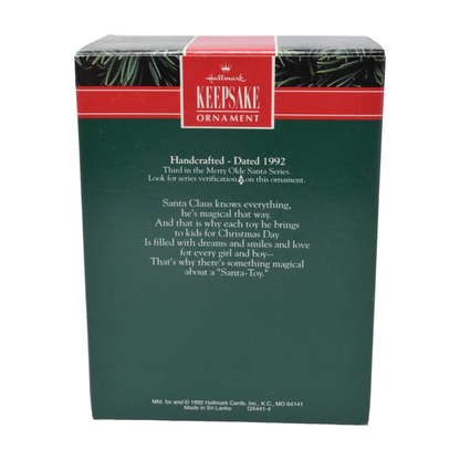 1992 Filling the Stocking Hallmark Ornament (Merry Olde Santa) QX4414