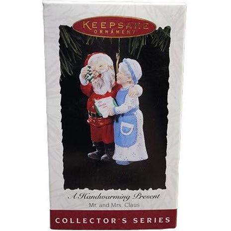 1994 A Handwarming Present Hallmark Ornament (Mr. and Mrs. Claus) QX5283