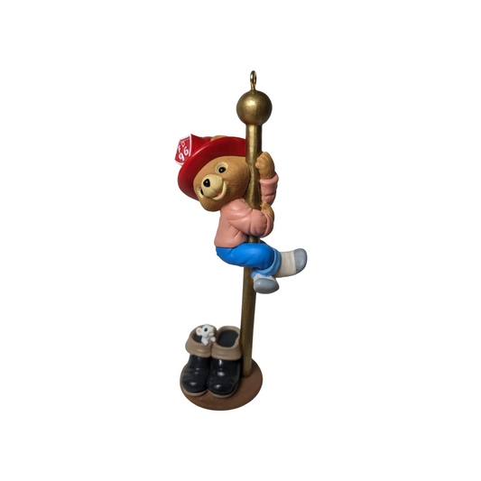 1996 Hurrying Downstairs Hallmark Ornament (Firefighter) QX6074 Image1