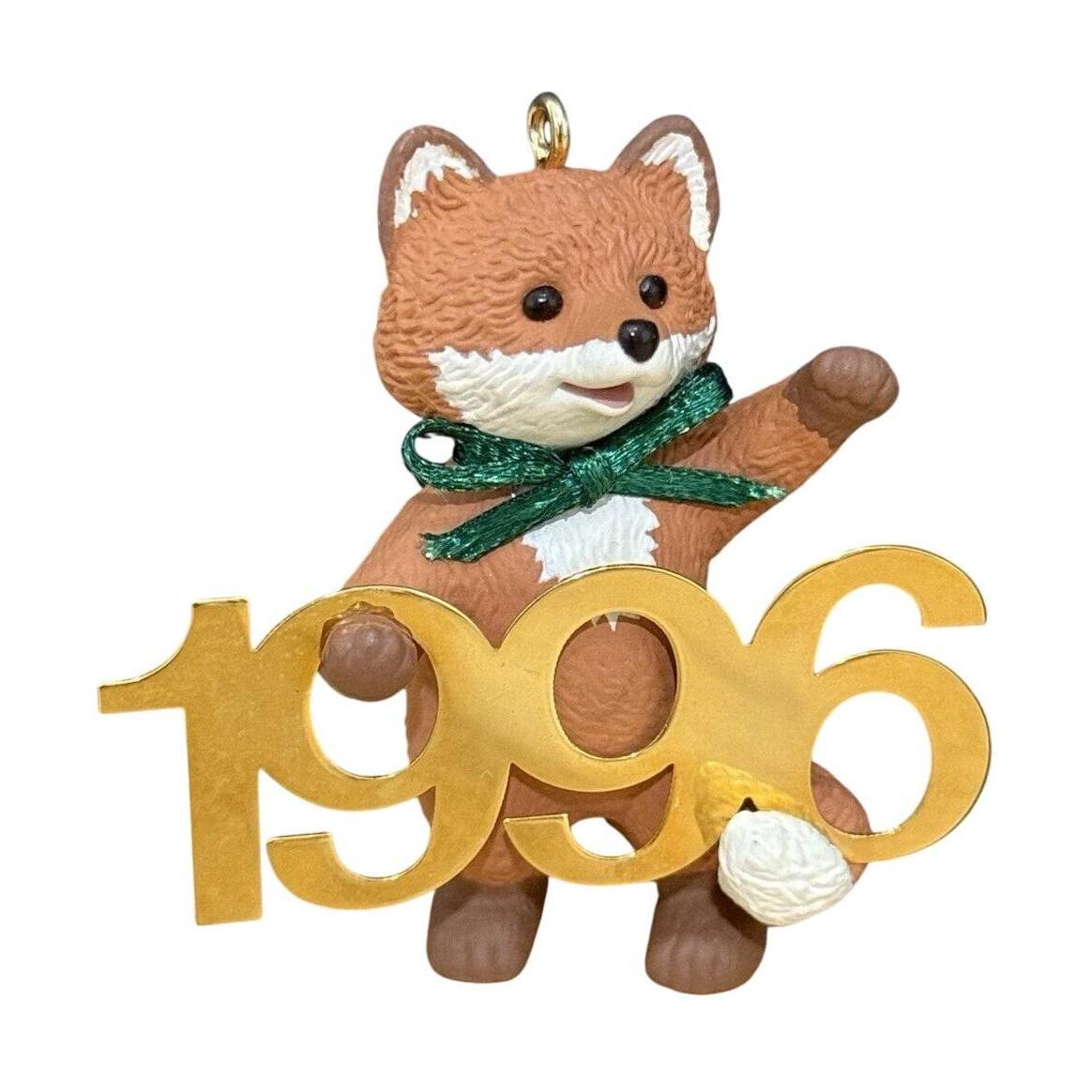 1996 Otter with Brass 1995 Hallmark Ornament (Fabulous Decade) QX5661 Image1