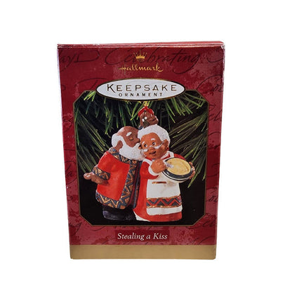 1997 Stealing a Kiss Hallmark Ornament (Santa Claus) QX6555