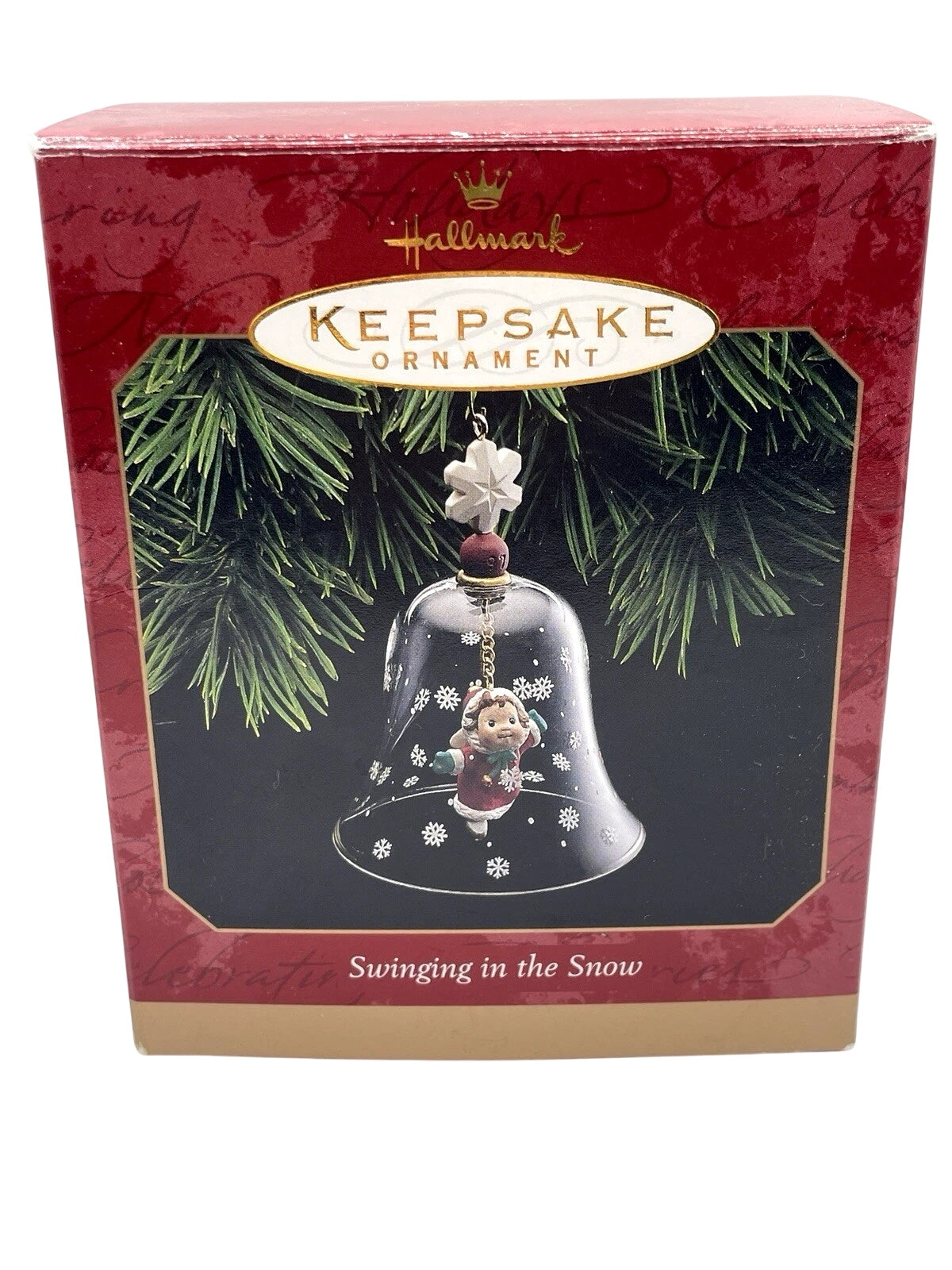 1997 Swinging in the Snow Hallmark Ornament (Bell) QX6775