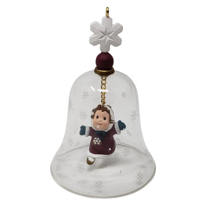 1997 Swinging in the Snow Hallmark Ornament (Bell) QX6775