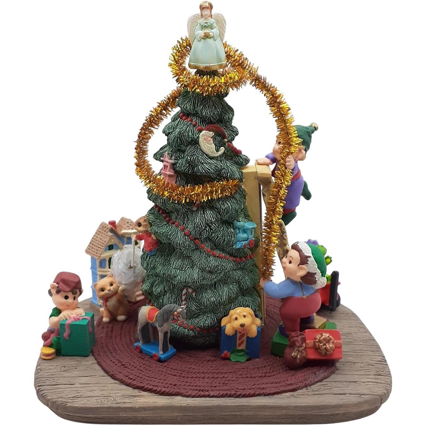 1997 Trimming Santa's Tree Hallmark Ornament (Christmas Tree) QXC5175