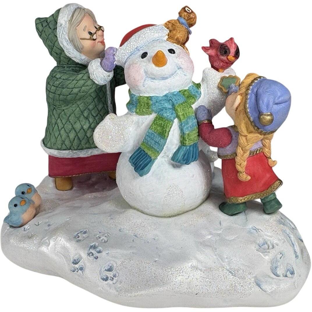 1999 Snowy Plaza Hallmark Ornament (Snowmen) QXC4669