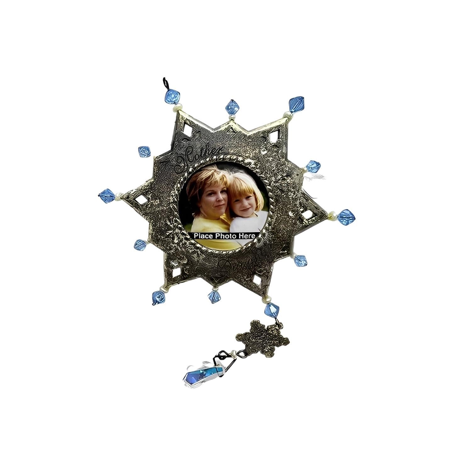 Decorative photo frame with star design and blue beads on a white background