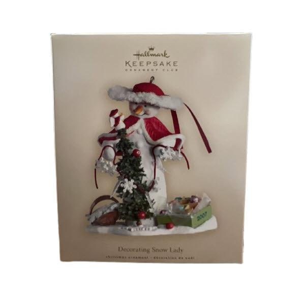 2007 Decorating Snow Lady Hallmark Ornament (Snowman) QXC7003