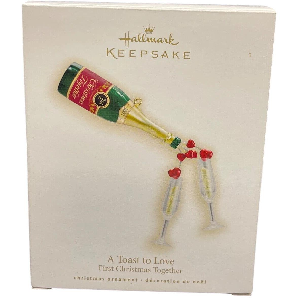 2009 A Toast to Love Hallmark Ornament (Our First Christmas) QXG6082