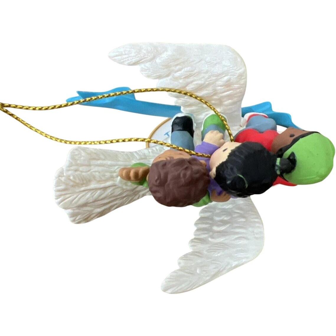 2011 UNICEF Believe in Peace Hallmark Ornament (UNICEF) QXI2287