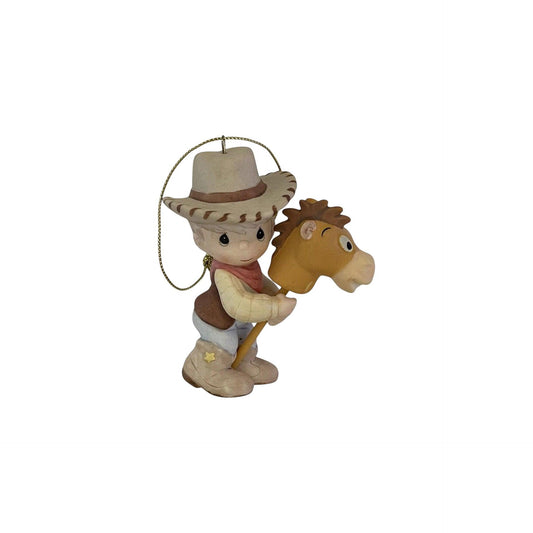 Cowboy figurine with a horse on a white background
