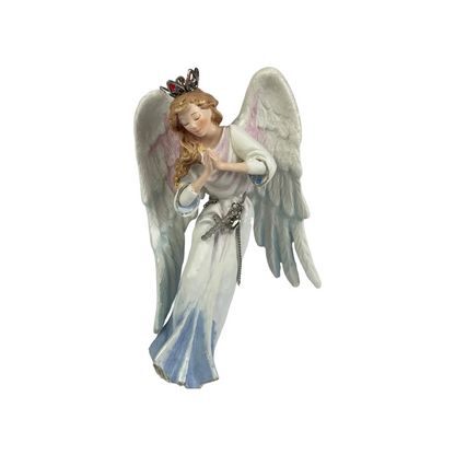 Angel figurine with wings and a tiara on a white background