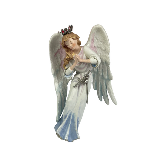 Angel figurine with wings and a tiara on a white background