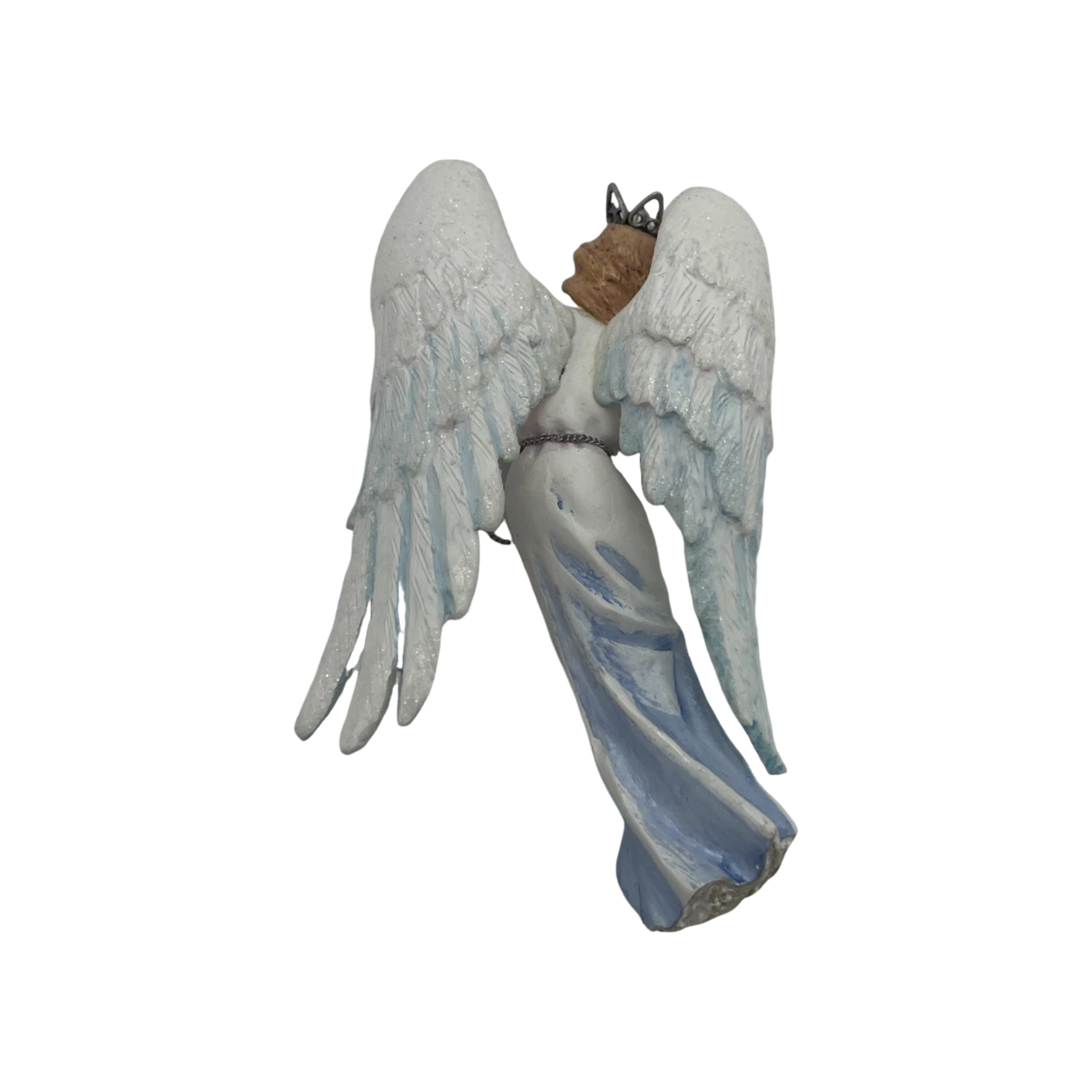 Statue of an angel with outstretched wings on a white background