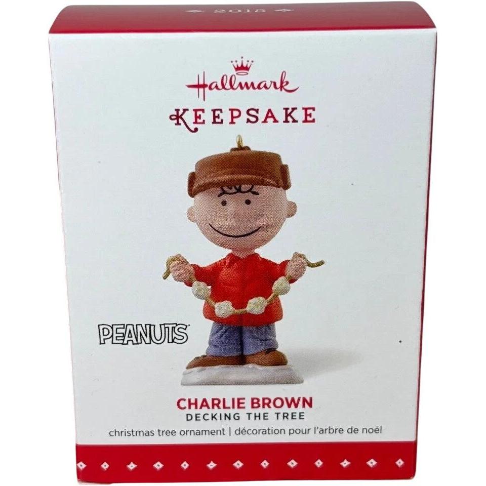 2015 Charlie Brown Decking The Tree Hallmark Ornament (Peanuts) QRP5903