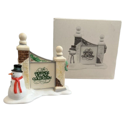 1989 Village Sign with Snowman (Heritage Village Series – Department 56, Item #1341354)
