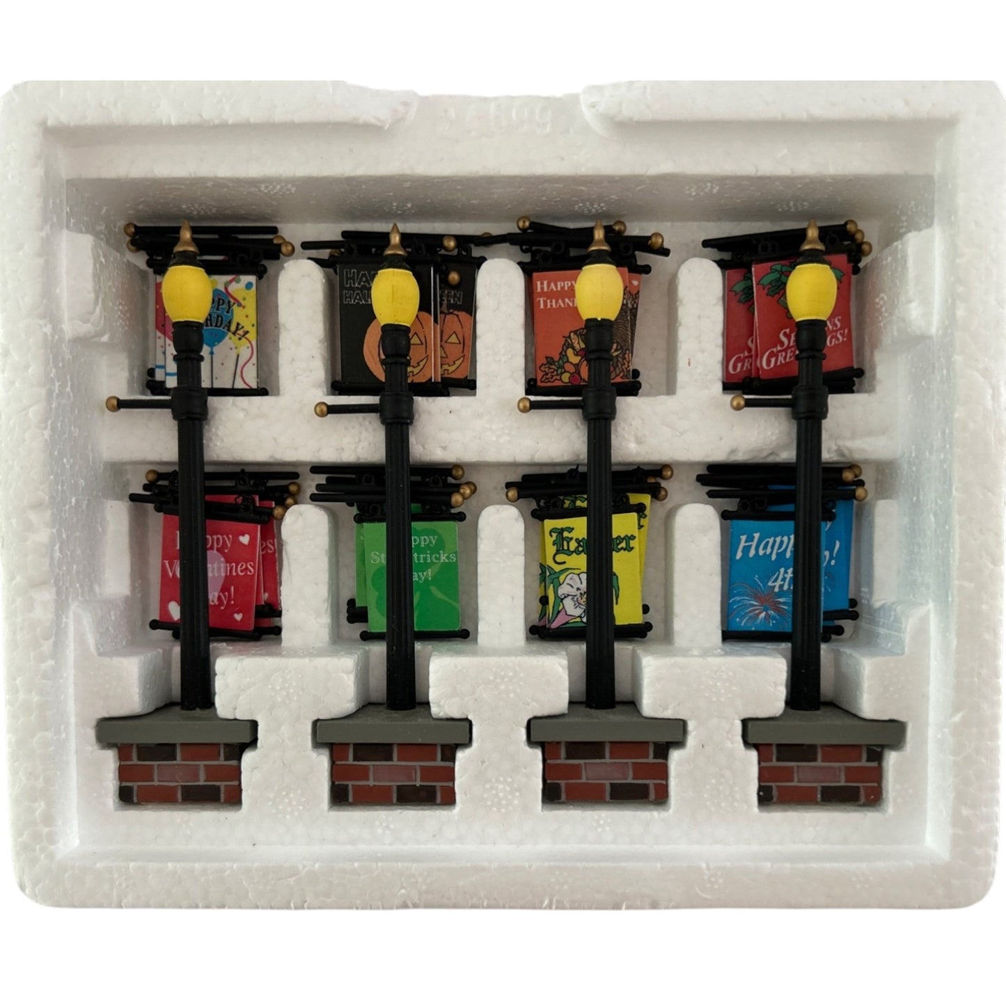 1999 (or effectively 2002) “Seasonal Lampposts (Set of 4)” – Department 56 Village Accessories, Item #56.53048