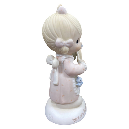 Adorable Precious Moments Girl Figurine: Heartwarming Porcelain Bisque