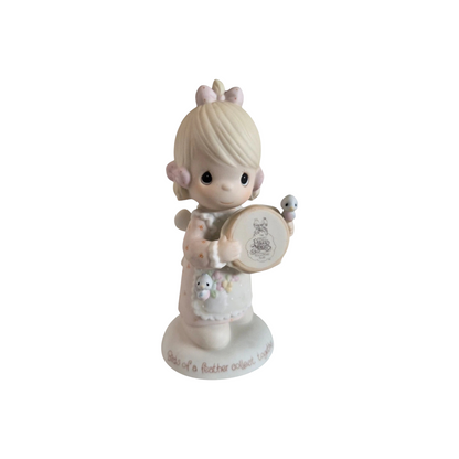 Adorable Precious Moments Girl Figurine: Heartwarming Porcelain Bisque