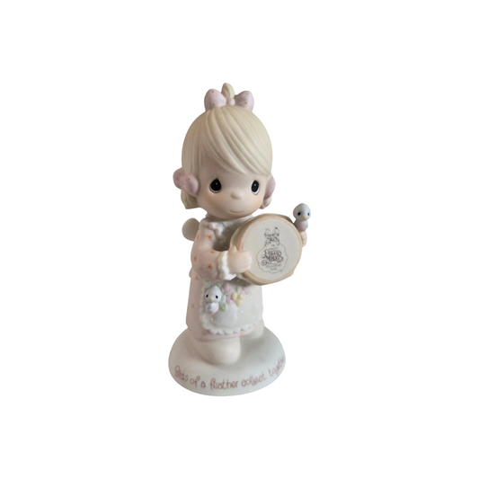 Adorable Precious Moments Girl Figurine: Heartwarming Porcelain Bisque