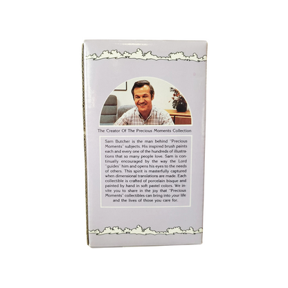 Adorable girl sews patch onto beloved teddy bear