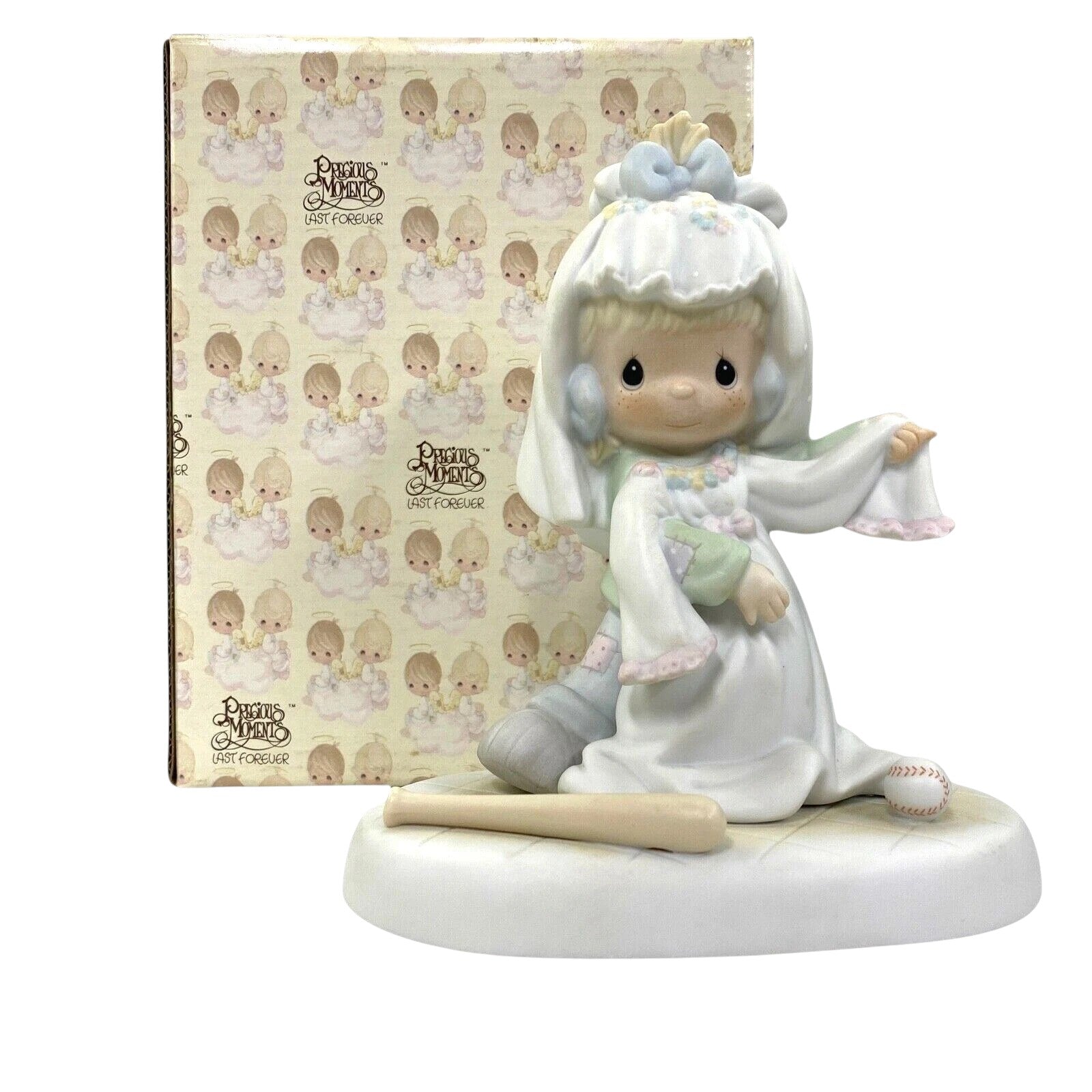 Little Girl Dreams of Wedding Day in Beautiful White Gown and Tiara