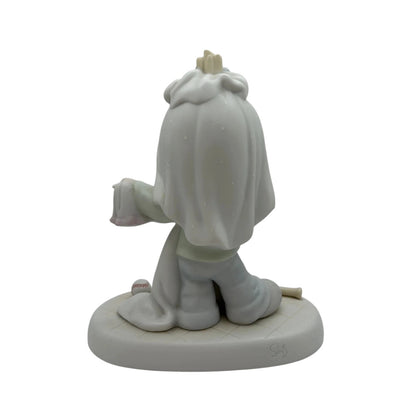 Little Girl Dreams of Wedding Day in Beautiful White Gown and Tiara