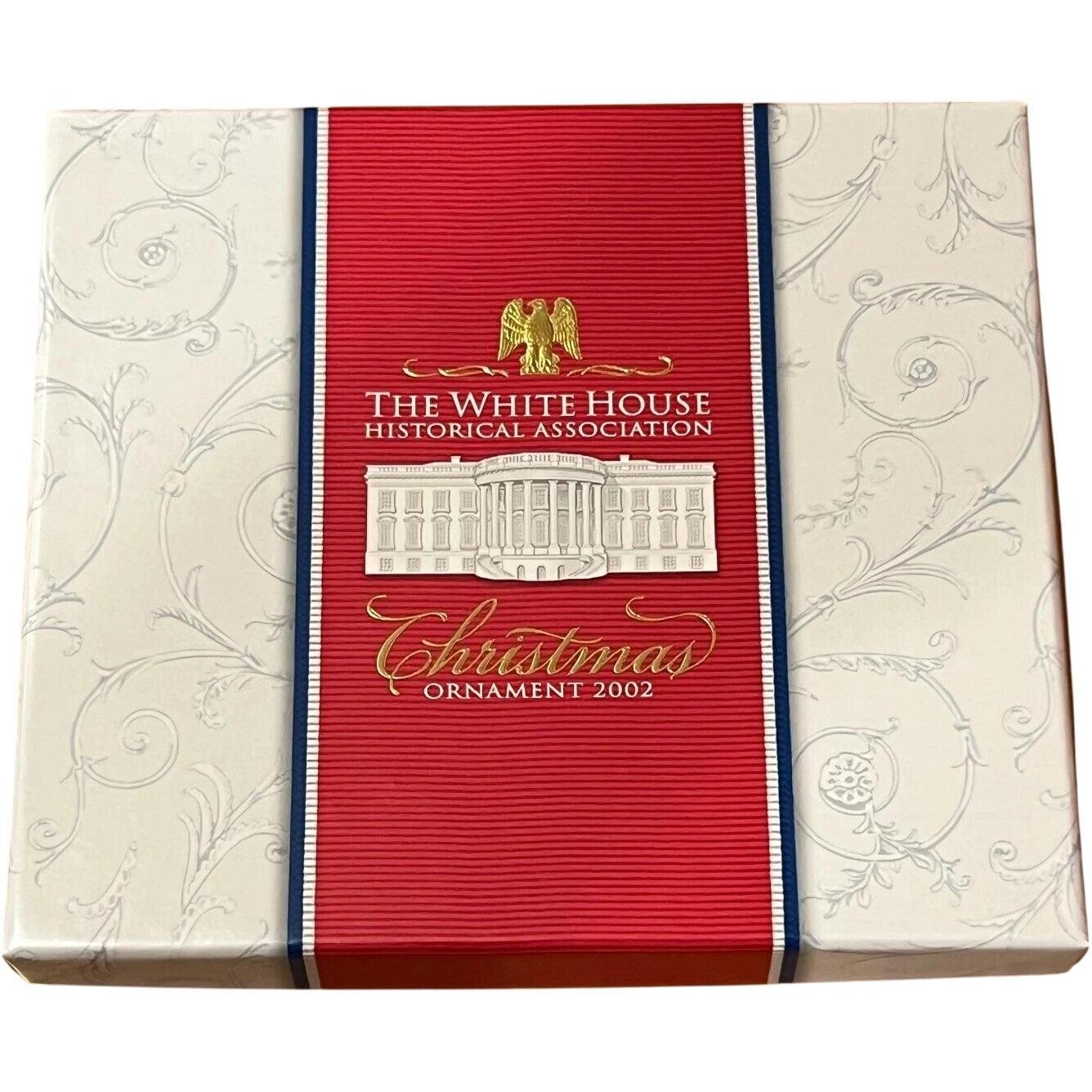 Opulent Gold-Adorned Building with Eagle Motif and Regal Pedestals