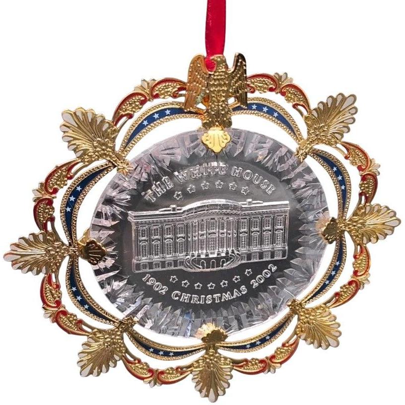 Opulent Gold-Adorned Building with Eagle Motif and Regal Pedestals