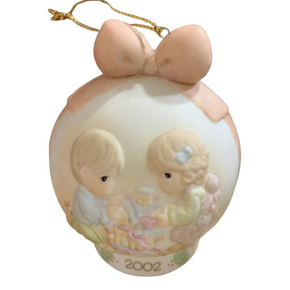 Precious Moments Boy and Girl Ball Ornament with Soft Pastel Colors