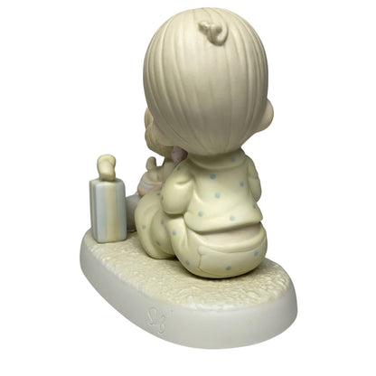 The Best Friend is a Dog Porcelain Figurine - Shop Now!