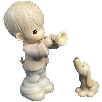 The Girl and Her Cat: A Curious Stare at an Empty Bird Cage