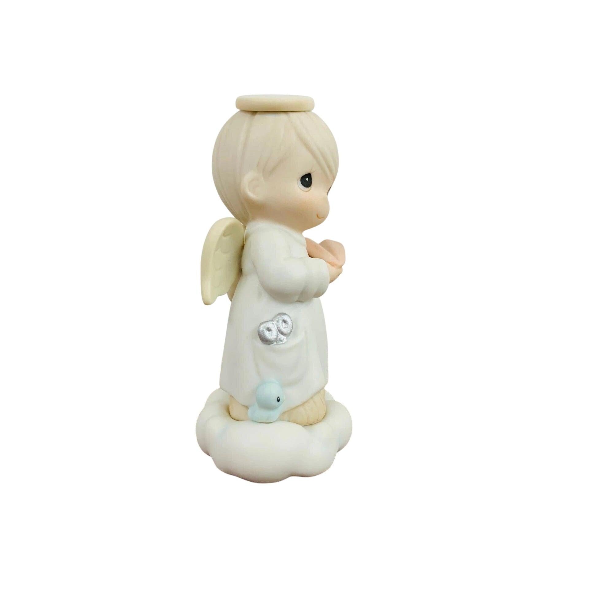 Adorable Child Figurine with Halo Holding Paper Plane - Sparking Joy and Imagination Image3